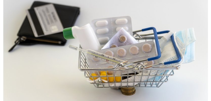 Market basket and wallet with Bank card. the increase in prices for medicines, the rise in the cost of medicament. financial crisis, inflation due to the pandemic coronovirus COVID-19 elearning brothers